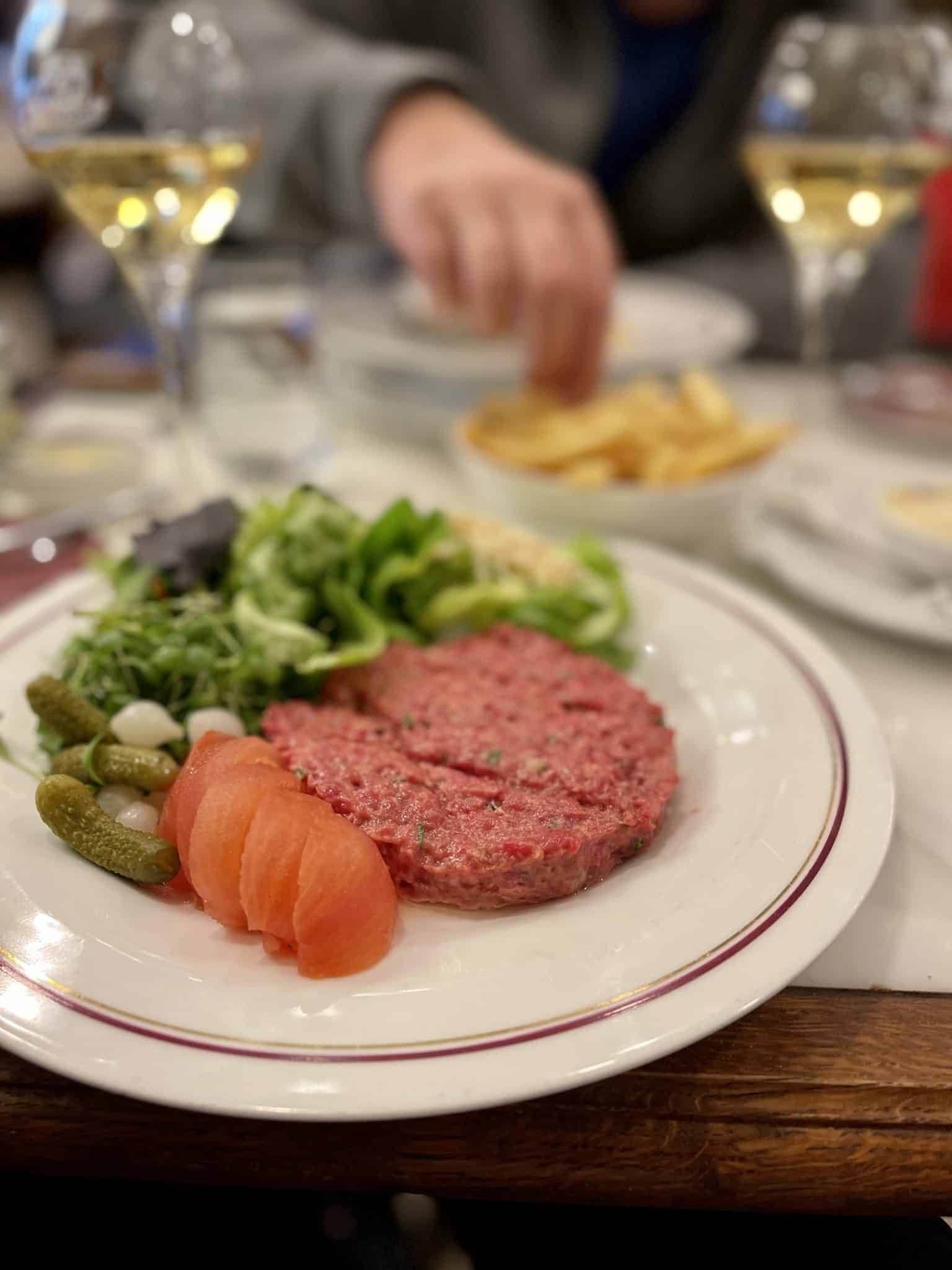 From salade Veulemans and chicken vol au vent to fish waterzooi and steak tartare: Aux Armes de Bruxelles, the best Belgian cuisine in Brussels.